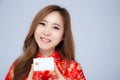 Happy Chinese New Year beautiful portrait young asian woman holding credit card present showing shopping online Royalty Free Stock Photo