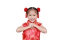 Happy chinese new year. Little Asian girl with Congratulation gesture isolated on white background Royalty Free Stock Photo