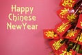 Happy Chinese New Year text greeting with traditional decorations