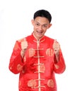 Happy Chinese new year.Young Asian man with gesture of congratulation Royalty Free Stock Photo