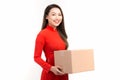 Happy chinese new year. Young woman holding gift box Royalty Free Stock Photo