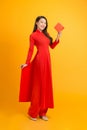 Happy chinese new year. young woman holding gift box Royalty Free Stock Photo