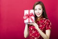 Happy chinese new year.young woman holding gift box Royalty Free Stock Photo