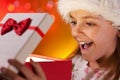 Happy christmas girl getting the present she wanted - closeup on Royalty Free Stock Photo