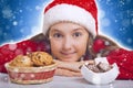 Happy Christmas girl wants to eat cookie Royalty Free Stock Photo