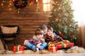 Happy Christmas - Kids with Christmas gift. Royalty Free Stock Photo