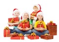 Christmas Kids Presents. Children in Hatewith with Gifts