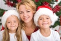 Happy christmas kids and woman Royalty Free Stock Photo