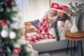 Christmas morning in the bed.Men and  woman at Christmas morning texing mesage Royalty Free Stock Photo