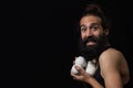 Happy circus juggler miming with his juggling balls