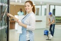 Happy cleaner maid woman in hospital