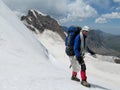 Happy climber on snow alpinist route Royalty Free Stock Photo