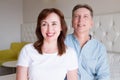 Happy closeup people faces. Smiling middle age couple at home. Family fun time weekend and strong love relationship. Healthy smile Royalty Free Stock Photo