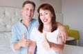 Happy closeup people faces. Smiling middle age couple at home. Family fun time weekend and strong love relationship. Healthy smile Royalty Free Stock Photo