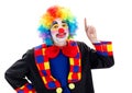 Happy clown pointing upward Royalty Free Stock Photo