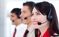 Happy co-workers with headsets on Royalty Free Stock Photo