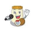 Happy coconut butter singing on a microphone