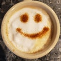 Happy coffee face in mug