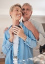 Happy, coffee and morning with senior couple and hug together for love, breakfast and support. Retirement, relax and Royalty Free Stock Photo