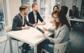 Collaborating business colleagues discussing future plans Royalty Free Stock Photo