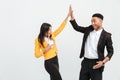 Happy colleagues business team gives a high-five to each other. Royalty Free Stock Photo