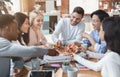 Happy colleagues eating pizza together in office Royalty Free Stock Photo