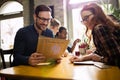 Happy colleagues from work socializing in restaurant Royalty Free Stock Photo