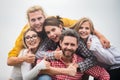 Happy company students best friends making selfies. Group young people posing together with thumb up. Multi ethnic Royalty Free Stock Photo