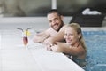 Happy cople relaxing at swimming pool Royalty Free Stock Photo