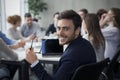 Happy corporate businessman smiling to camera at meeting Royalty Free Stock Photo