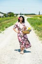 Happy countrygirl walking Royalty Free Stock Photo