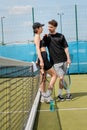 happy couple in active wear hugging Royalty Free Stock Photo