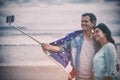 Happy couple with American flag taking selfie Royalty Free Stock Photo