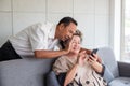 Happy couple asian senior retired using mobile tablet application technology for social network among friends community via