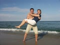 Happy couple on the beach Royalty Free Stock Photo
