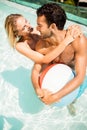 Happy couple with beach ball Royalty Free Stock Photo