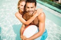 Happy couple with beach ball Royalty Free Stock Photo