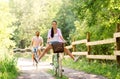 Happy couple with bicycles at summer park Royalty Free Stock Photo