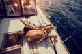 Couple on boat sunbathing and enjoying on summer day Royalty Free Stock Photo