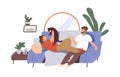 Happy couple with cat relaxing on sofa at home. Man and woman talking, playing with kitty, resting on cozy couch