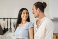 Happy couple caucasian have fun making breakfast in kitchen. Love together. Husband and wife embracing enjoy cooking. Male and Royalty Free Stock Photo