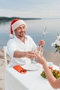 happy couple celebrating christmas and clinking champagne glasses Royalty Free Stock Photo