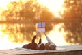 Happy couple of children dreaming of a house with solar panels Royalty Free Stock Photo