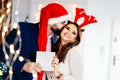 Happy couple at Christmas. Christmas kiss. Royalty Free Stock Photo