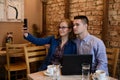 Happy couple in a coffee shop