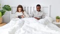 Happy couple with computer tablet and smartphone on winter morn Royalty Free Stock Photo