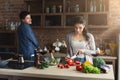 Happy couple cooking healthy food together Royalty Free Stock Photo