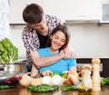 Happy couple cooking lunch Royalty Free Stock Photo