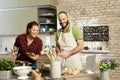 Happy couple cooking together