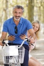 happy couple on country bike ride Royalty Free Stock Photo